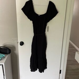 Cute off the shoulder, black mid length dress